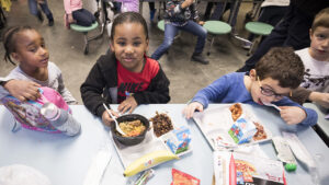 Kids eating lunch at school cafeteria